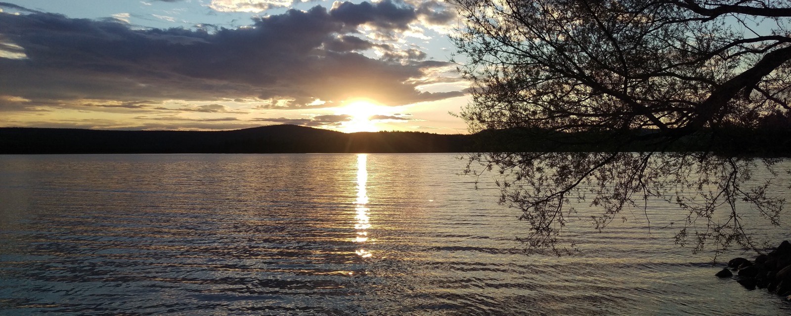 Golden light on gently rippled water